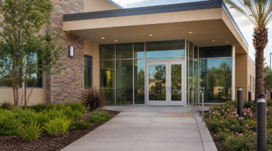 Community clinic entrance with landscaped walkway