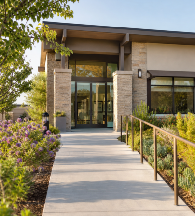 Clinic entrance with accessible walkway and landscaping