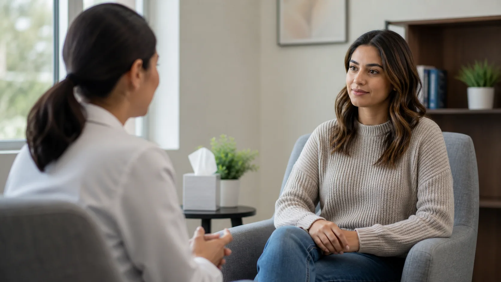 Healthcare professional speaking with a patient during a private mental health support visit